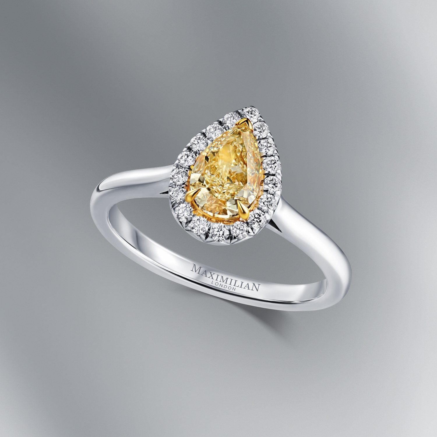 Fancy Light Yellow Pear Diamond Ring